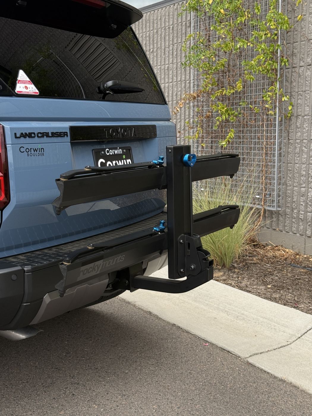 RockyMounts GuideRail hitch bike rack mounted on the Land Cruiser